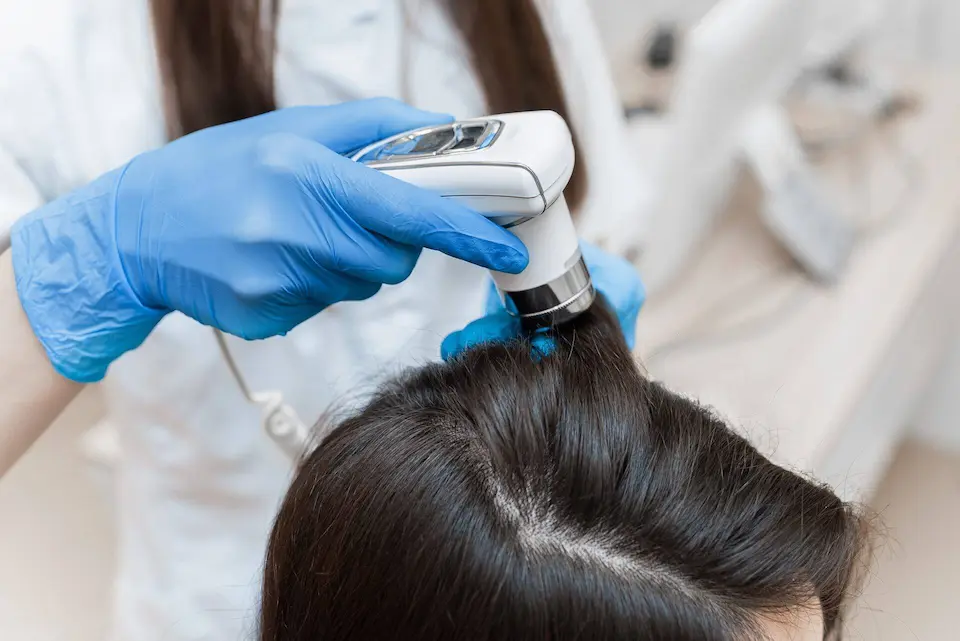 Laboratory professional processing hair and scalp specimens